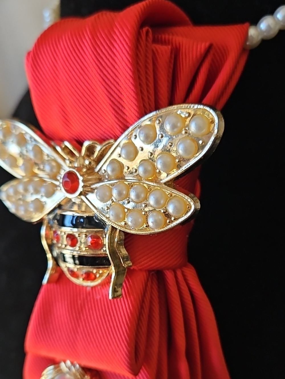 Upcycled Orange Red Necktie Necklace with Gold Bee Brooch and Pearl Accents - Picture 5 of 6